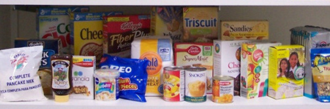 Shelves of donated groceries at the St. Vincent de Paul food pantry.