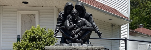 The bronze Generations statue of the Holy Family with Saints Anne and Joachim.